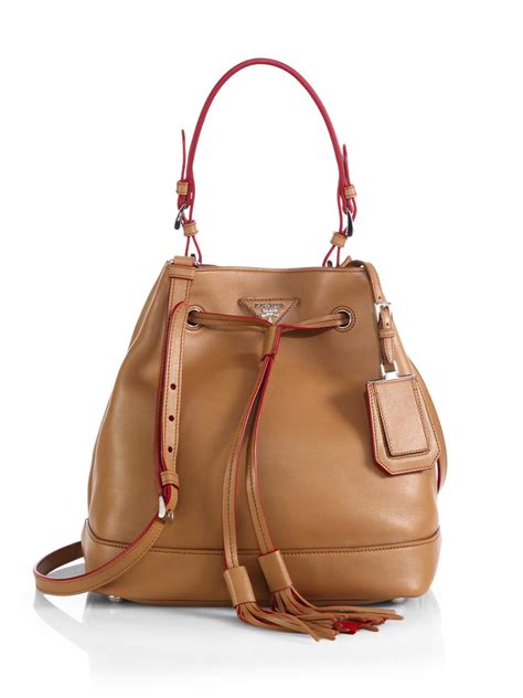 prada brown bucket bag|Prada wicker bucket bag.